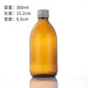 Botellas de vidrio selladas a prueba de luz color café en existencia, disponibles en múltiples tamaños, gran capacidad, engrosadas, a prueba de fugas, para dispensar líquidos orales