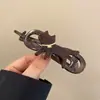 Pinza para el pelo de dibujos animados peculiar con giro para niñas, pinza de garra para el pelo de alta gama para la parte posterior de la cabeza, accesorio para el cabello