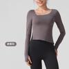 Ropa de Yoga Nueva Camiseta Deportiva de Manga Larga Nude de Alta Elasticidad para Mujer Todo en Uno con Copa Fija Ropa de Fitness de Alta Gama Primavera y Verano