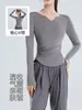 Roupa de Yoga de Alta Qualidade para Mulheres Nova Coleção Primavera & Outono 2026 Camiseta Manga Longa Decote V de Secagem Rápida Top Esportivo Roupa para Corrida Matinal Fitness