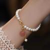 Pulsera con colgante de perla de agua dulce natural súper inmortal para mujer de Corea del Sur, pulsera de melocotón sencilla y distintiva para novia, sentido de alta calidad