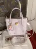Bolso Cruzado de Hombro Casual de Nicho Transfronterizo para Mujer Primavera 2026 Nuevo Dulce Gran Capacidad Simple y de Moda Bolso Cruzado Tipo Cubo