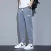 Calça Jeans Masculina Outono Nova Estilo Coreano Primavera Modelagem Solta Jogger Cargo com Apliques Moda Casual Tendência Comprimento Cropped