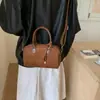 Bolso bandolera retro casual estilo coreano, bolso cuadrado pequeño para mujer, nuevo de alta gama Otoño 2025, bolso de hombro cruzado de gamuza contrastante