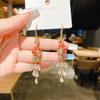 Pendientes de lazo de terciopelo rojo con ambiente de moda, temperamento femenino, flor dulce, borla larga, pendientes Joker al por mayor