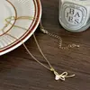 2026 Cadena Elegante para Clavícula para Mujer con Baño de Oro Real, Microincrustaciones de Circonia, Diseño Único y Collar con Lazo, Exquisito y Sencillo