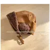 Sombrero de Lana de Cordero para Niños Estilo Coreano Otoño/Invierno Nuevo con Protección para Orejas Versátil de Atar Cálido Sombrero Pullover Moderno para Ciclismo Auricular Lei Feng
