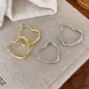 Ear Cuff de Corazón Hueco Simple Pendientes Metálicos de Corazón Grande Estilo Coreano Nicho Gama Alta Versátil Pendiente para el Trabajo Protectores de Pendientes