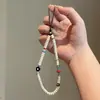 Cadena de Muñeca Hecha a Mano Ins Flor Negra con Cuentas Cadena Colgante para Teléfono Móvil de Color Contrastante Lindo Correa Anti-Pérdida para Cámara D