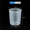Taza medidora pequeña de plástico con marcas de escala en mililitros para uso doméstico, Taza medidora pequeña para bebé con tapa, Contenedor 5ml 10ml 50ml 100ml