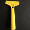 Suministro de origen cuchillo de limpieza para pegamento de vidrio de hoja amarilla y negra limpieza del hogar limpieza mármol decoración del hogar cuchilla de limpieza