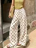 Comercio exterior transfronterizo ropa de mujer 2026 estilo francés casual pantalones de pierna ancha de lunares para mujer, pantalones rectos casuales con cordón y cintura elástica