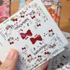 Encabezados de tarjetas de Año Nuevo con dibujos animados de alto valor estético, tarjetas de decoración para envoltorios de regalo, arreglos de tarjetas con ambiente de Año Nuevo.