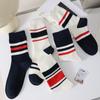 Calcetines nuevos para mujer, calcetines altos hasta la pantorrilla, otoño e invierno, estilo japonés, calcetines deportivos de moda hasta la pantorrilla, calcetines altos a rayas.