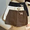 Foto Real de Falda de Moda Retro con Estampado de Lunares de Cintura Alta Adelgazante, Falda Corta Anti-Exposición, Falda Bodycon, Falda de Corte A para Mujer en Verano