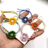 Cuerda para el pelo con cabeza de flor de margarita pequeña estilo Quan Zhilong, cuerda para el pelo con corazón de chica japonesa y coreana, anillo para el pelo de tendón de goma, dulce, todo a juego