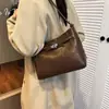 Bolsa Tote de Nicho Estilo Coreano para Mulheres 2026 Nova Tendência Moda Retrô Bolsa de Ombro Transversal Bolsa Kelly de Alta Qualidade