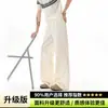 Pantalones casuales con textura relajada, pantalones de hombre de pierna ancha, holgados y ligeros, con un estilo fluido y desenfadado, de corte recto, versátiles para el verano.