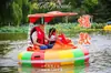 Botes chocadores de agua a láser, botes eléctricos para niños y padres, botes de parque, botes turísticos, botes de pedales y botes de plástico a batería para parejas