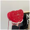 Bolsa Estilo Doce de Menina 2025 Nova Bolsa de Ombro com Pérolas em Forma de Coração Bolsa Transversal Feminina de Nicho com Corrente Romboidal