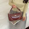 Bolso de hombro liso de moda minimalista transfronterizo, bolso de axila popular versátil de nicho para el día a día, bolso de mano texturizado