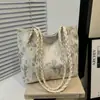 Bolso de un solo hombro para mujer, nuevo estilo chino, para debajo del brazo, estilo coreano, bolso mariposa, bandolera de moda, bolso tote de gran capacidad, nuevo bolso para mujer 2026