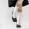 Calcetines de mujer otoño e invierno nuevos calcetines de doble capa con costuras personalizadas calcetines de felpa de nicho calcetines de punto doble de color contrastante para pantorrilla