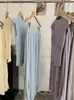Conjunto de Dos Piezas Omalai: Chaleco de Punto sin Mangas con Flores Tridimensionales y Falda Larga Nueva Colección Primavera/Verano 7007