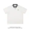 Camiseta a Cuadros de Empalme Contrastante Estilo Coreano de Manga Corta para Hombre Verano 2025 Nuevo Retro Holgada Ajustada Cuello Polo