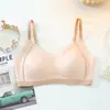 Roupa íntima de látex da Tailândia feminina sem fio para seios pequenos com bojo push up sem costura com botões sutiã top esportivo com babados