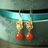 Aretes de calabaza con cuentas rojas del sur incrustadas chapados en oro de plata esterlina S925 aretes populares retro nueva tendencia nacional