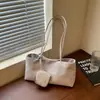 Bolso tote de nailon estilo coreano de nicho para mujer 2026, simple, de gran capacidad, ligero, moderno, bolso de hombro versátil