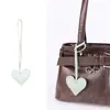 Colgante de Bolsa Casual de Cuero PU Corazón de Melocotón Corazón Relleno de Algodón Cuero Regalo de Pareja Colgante de Llavero Fábrica Venta al por Mayor