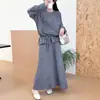 Conjunto feminino de duas peças estilo coreano novo para o início do outono, novo estilo outono e inverno, conjunto de suéter com punho de laço vazado e saia