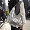 Bolso de lunares de gran capacidad estilo relajado para mujer, nuevo bolso de mano simple de moda 2026, bolso tipo cubo, bolso de hombro para el trabajo