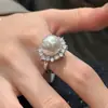 Anillo de plata con circón de perla blanca radiante de temperamento coreano, anillo de dedo índice ligero de lujo, exquisito, de alta calidad, para mujer socialité