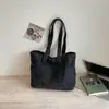 Moda Estilo Coreano Bolsa de Mão para o Trabalho Bolsa Grande Feminina 2026 Novo Estilo Bolsa Tote de Jeans Alta Aparência Bolsa de Ombro Leve