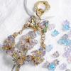 Aretes, Pulseras, Cadenas para Teléfono, Colgantes para Coche, Accesorios DIY, Accesorios para el Cabello y Arte con Cuentas Heidi Transparentes Perforados de Lirio del Valle con Galvanoplastia UV