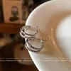 Pendientes Minimalistas Metálicos Populares Transfronterizos Europeos y Americanos de Aguja de Plata S925 Pendientes de Botón de Personalidad Simples Versátiles