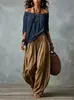 2026 Conjunto de mujer transfronterizo europeo y americano Amazon TK nuevo top largo holgado de hombros descubiertos + pantalones de campana