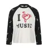 Camiseta de manga larga con cuello redondo, 100% algodón, con estampado de corazón y nota musical, estilo callejero americano moderno, para hombre, TaelePlus, TP565