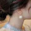 Pendientes de Perla Grandes Exagerados 2026 Nuevo Estilo Popular de Nicho Ganchos para Orejas de Moda Pendientes de Lujo Ligero de Gama Alta Venta al por Mayor