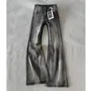 Chao Li tiene en stock jeans de microcampana lavados y desgastados para mujer Otoño 2026 de cintura baja, adelgazantes, casuales, versátiles, pantalones largos