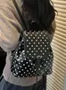 Mochila de lunares de nicho estilo coreano para mujer, nueva moda popular 2026, mochila pequeña versátil de gran capacidad con asa