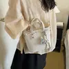 Bolso de mano dulce y versátil con patrón de rombos, bolso tipo cubo moderno de estilo coreano, versátil para ir al trabajo, bolso cruzado tipo cubo de alta gama