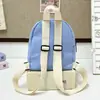 Mochila Mini Lona Infantil 2026 para Meninos e Meninas do Jardim de Infância com Pingente de Desenho Animado, Mochila Casual para Bebê