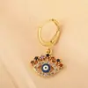 Pendientes de ojo de diablo con microincrustaciones de cobre y circonita de color para mujer, de nueva moda, con gran retención de color y diseño de nicho con personalidad transfronteriza.