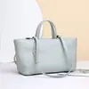 Nuevo bolso de mano para mujer hecho de cuero genuino, bolso de hombro, bolso tote de piel de vaca transfronterizo, bandolera de nicho, cuero suave vintage, gran capacidad