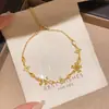 Pulsera con colgante de flor de circonita, lujo ligero, alta gama, pulsera sencilla, nicho, exquisita, personalizada, moderna, joyería versátil para mujer