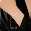 Pulsera de Concha con Mariposa Incrustada de Circonita, Lujo Ligero y Sensación de Alta Gama, Joyería Elegante y Fresca de Estilo Dulce al por Mayor